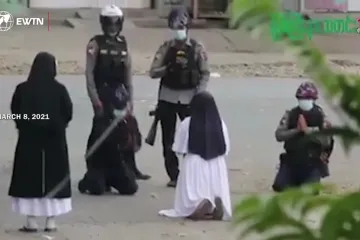 Catholic nun begs police not to shoot protesters during Myanmar unrest